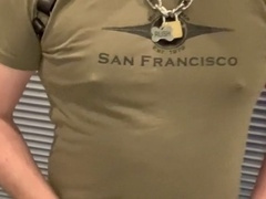 Muscular hunk strokes his massive uncut cock with his bulging balls