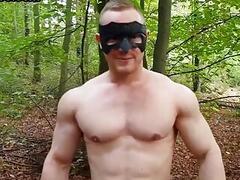 Masked muscled stud solo masturbates outdoor and cums