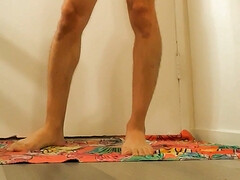 Borila dries his sexy naked body with a towel after bath