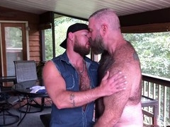 Muscle daddy Liam Angell enjoys a wild three-way with young bears