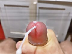 Cumming in close-up with a massive portion of cum in slow motion. Big Uncut Veiny Cock. Pissing