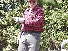 Part 1 of 2, Lumberjack dad sawing tree