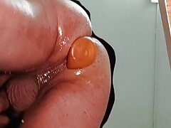 Luciano penetrates his ass with plug and courgette