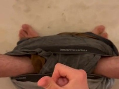 Ultra-Kinky stud strokes off and blows a load after piss trousers accident