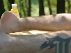 Handsome young gay treated with outdoor breeding session