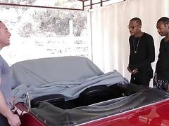 Two black guys have fun with this white dude