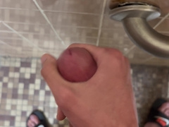 SlimSean spunking in a public shower