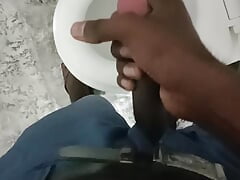 A young boy having fun in bathroom