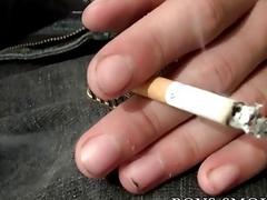 Horny hunk smoking and stroking his cock
