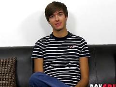 Handsome twink has fun at an interview before jerking off
