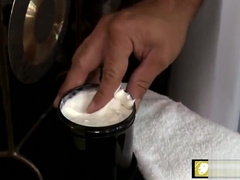 Young dude massaging big fat cock