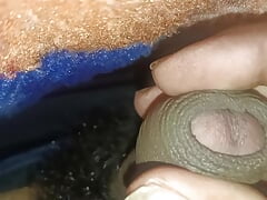 The thick black cock released its fluid while shaking it.