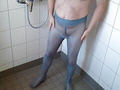 Pissing in blue tights