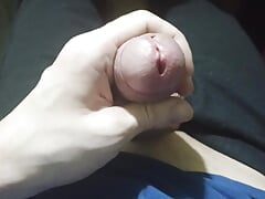Guy in chair jerking off cock