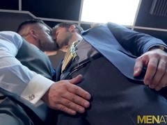 Suited Latin stud Gabriel Lunna breeds Dario Beck in an office setting