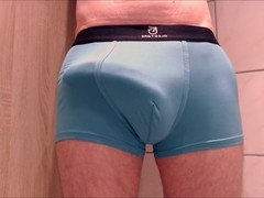 Douche with a big cock grows while skinny boys admire