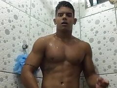 Latino showers and shows off
