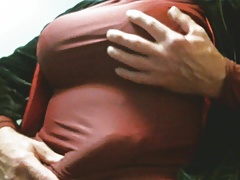 Playing in a new tight red dress.