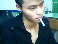 Handsome chinese boy plays his ass