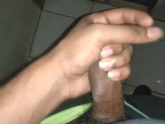 Young man tugging in the rest room