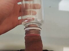 Amateur pissing in a bottle