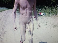 Naked skinny huge hung guy with hard on outside