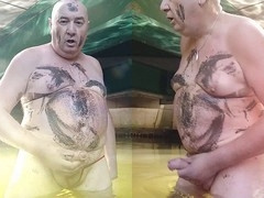 Chubby Euro gay Pascal masturbates to gay music outdoors in stocking and lingerie