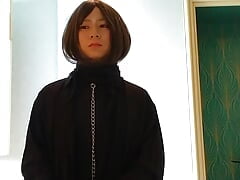 A man&#039;s wearing a collar masturbates wearing full-body tights