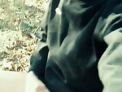 Huge cumshot on black shirt in the park