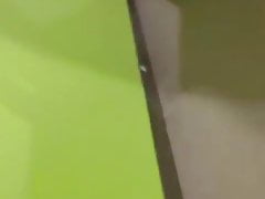 Older man peeing