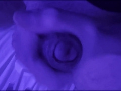 Onanism with fake penis in the backside