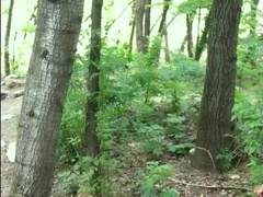 Bad guy strokes while smoking ciggy in a woods - nearly caught - so his scrotum linger utter