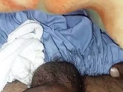 Very good looking guy rubbing his dick on his bed