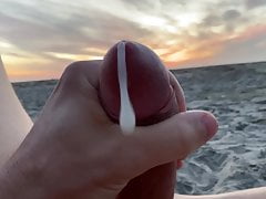 Outdoors masturbation jacking off public beach at sunset