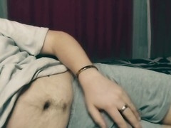 Naughty young guy pleasures himself on the bed in hopes of getting caught.