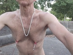 Gay slave endures outdoor BDSM close-up humiliation