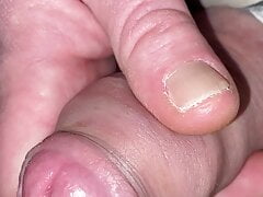 Close up edging tight foreskin with big cockhead