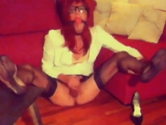 Slutty CD Valerie strokes her big cock in black stockings