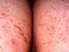 A man exposes his asshole. Take a close-up shot so you can see the wrinkles clearly