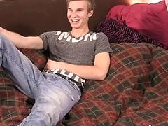 Twink strokes his cock before cumming
