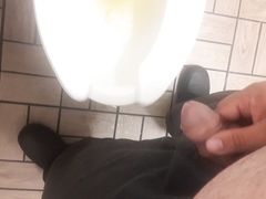 Peeing and then stroking it a little before going back to work