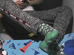 Taking a rest with my barefeet and sweaty green socks at night