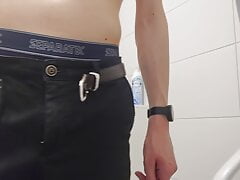 Young man takes shower and masturbates (shaved, cut penis)
