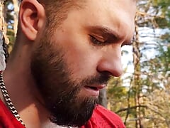 Bearded cub got his ballsack emptied by his tattooed buddy after a big hike in the woods.