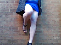 Sissy smoking outdoors in sexy dress