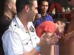 Guy opens his mouth for male stripper cum