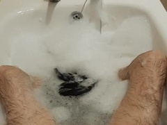 Draining in the Tub in Bathing Suit