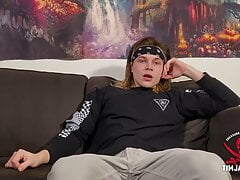 Skater guy jacks his uncut cock