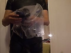 Unboxing latex body with tits and suspenders