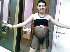 Sexy sissy crossdresser Sweet Lollipop in strapless lingerie, thong, and accessories.